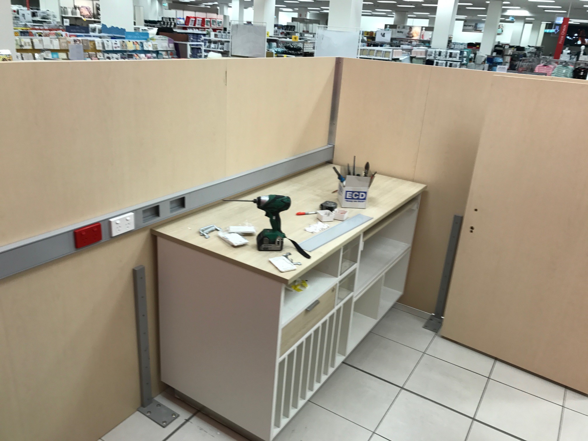 Installation of fixture fittings Sydney - Target Shop - Cashroom